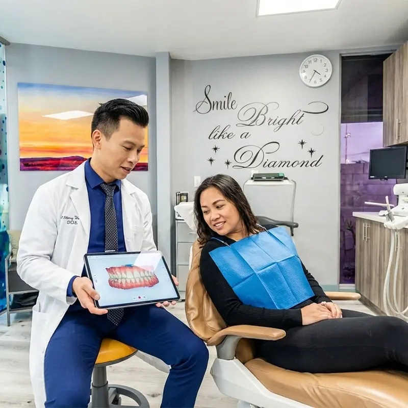 Doctor showing digital treatment plan to patient